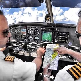 pilot co-pilot looking at map