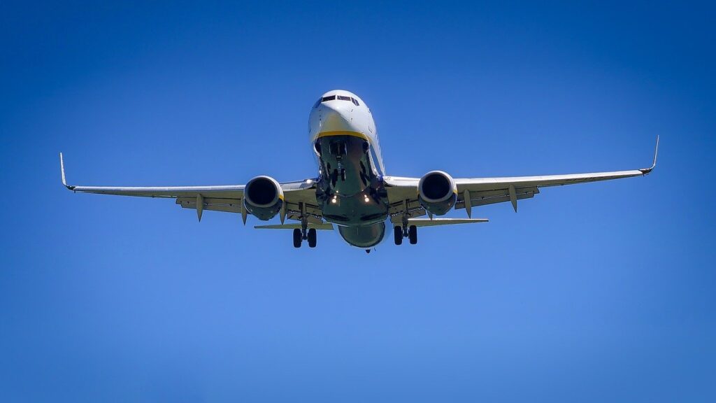 Plane flying on a nice blue day