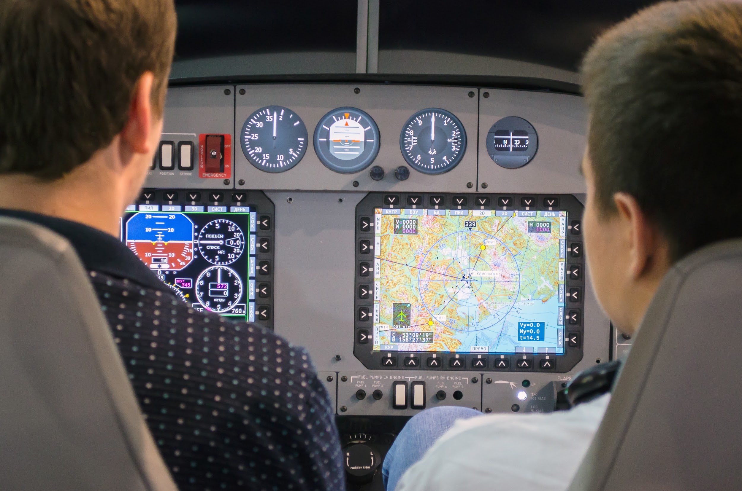 Simulator of a passenger aircraft with a cockpit and pilots