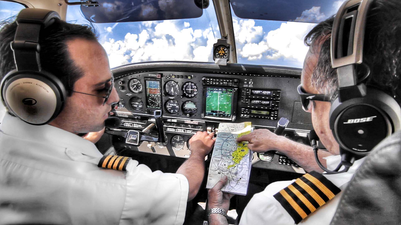 pilot co-pilot looking at map
