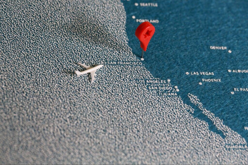 Handmade blue map with pin.