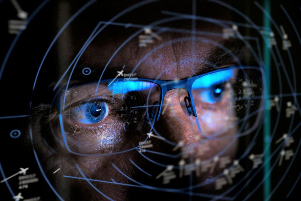 close up of air traffic controller looking at screen selective focus