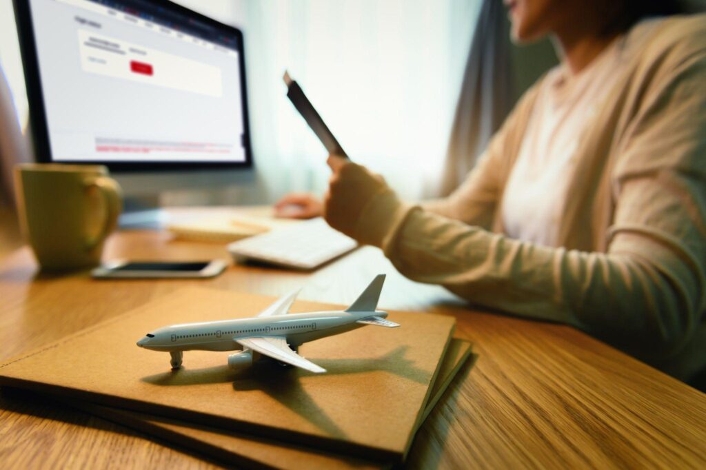 Student checking flight status online