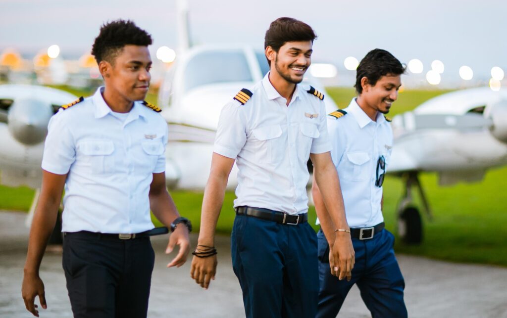 pilots walking on airfield