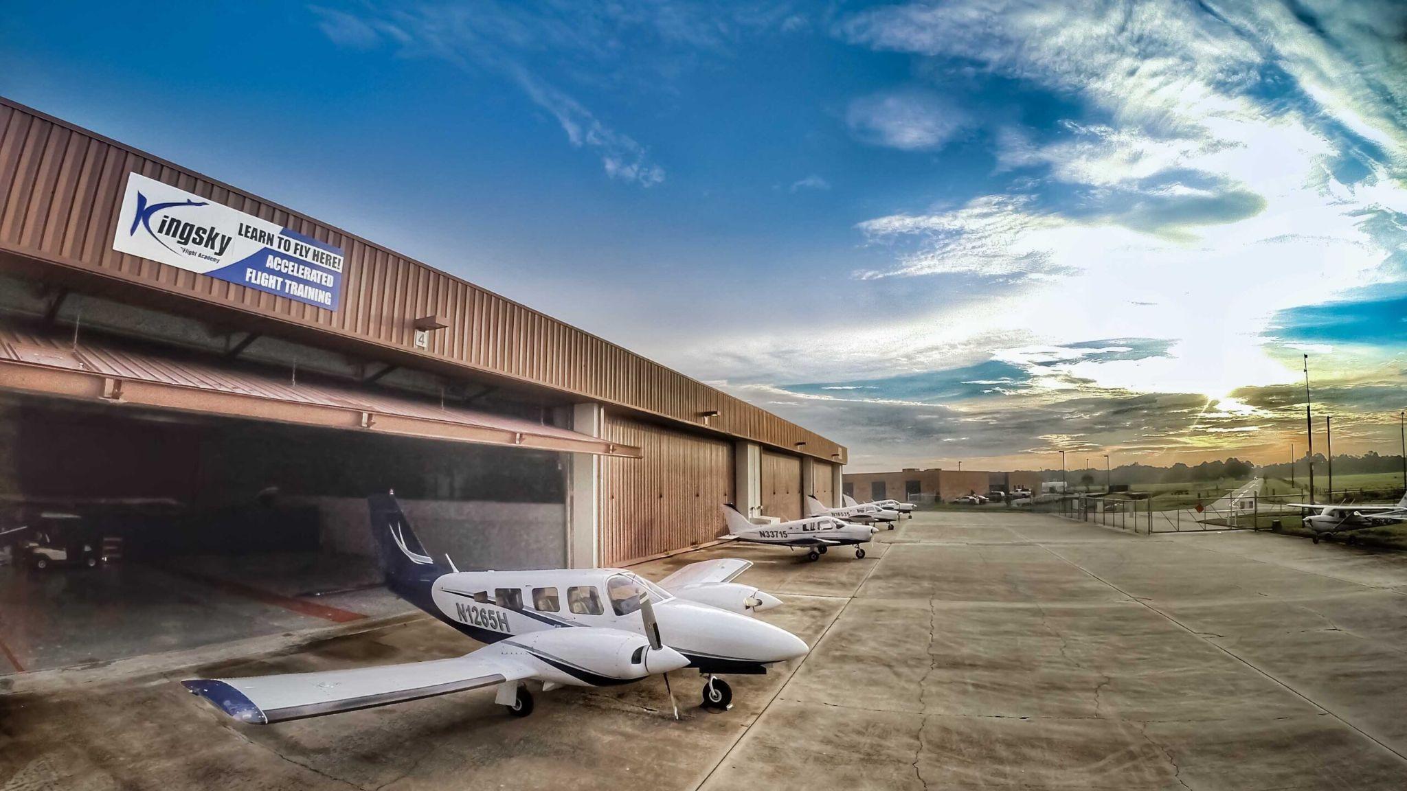 Private airplanes on tarmac at Kingsky Flight Academy. 