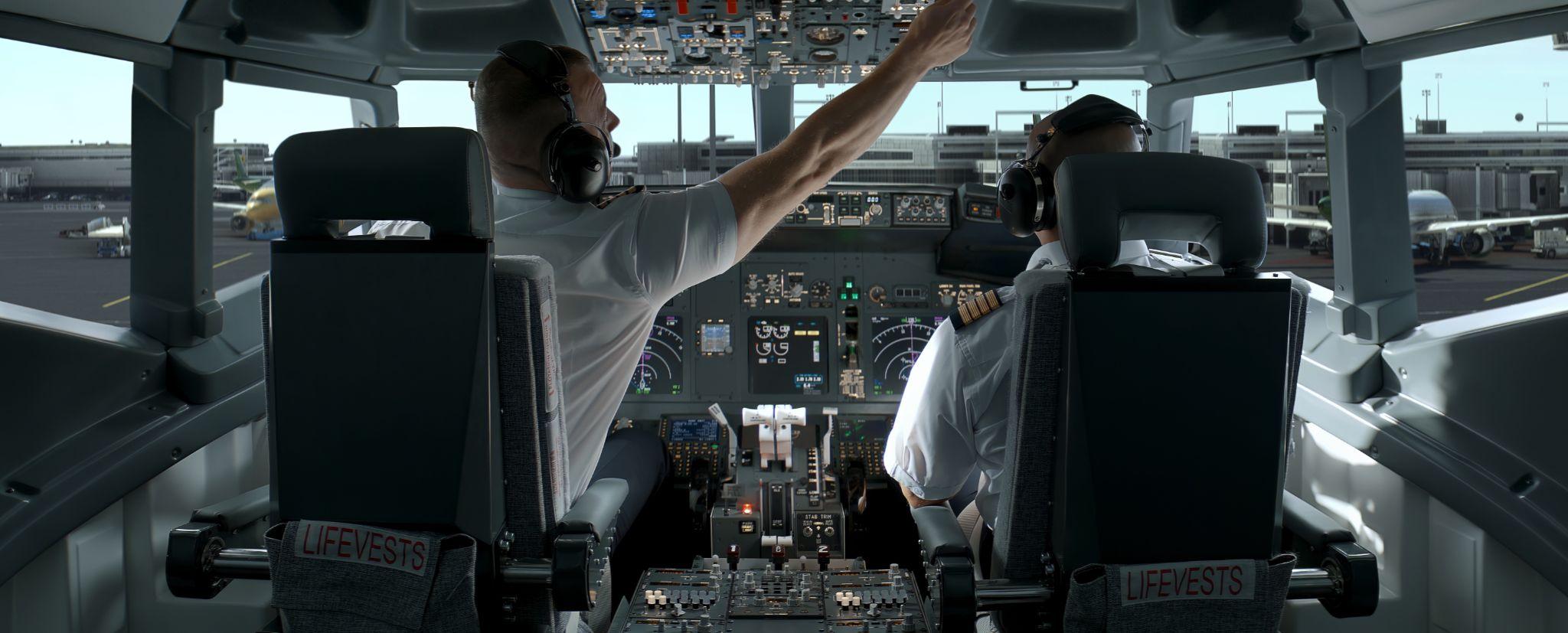 Commercial aircraft pilots going through check list at the airport before the flight.
