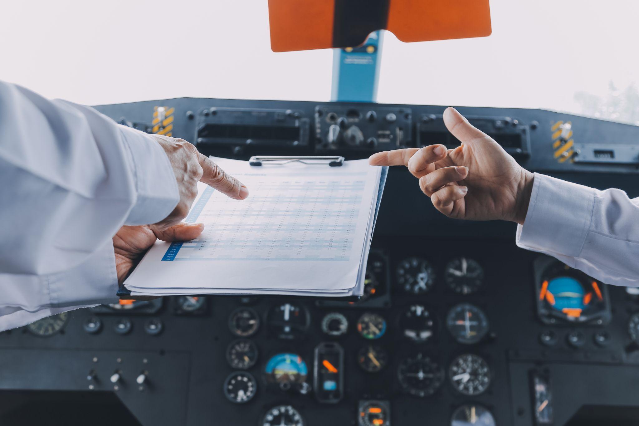 Professional pilot woman in uniform has teamwork meeting for success flight in aviation business. 