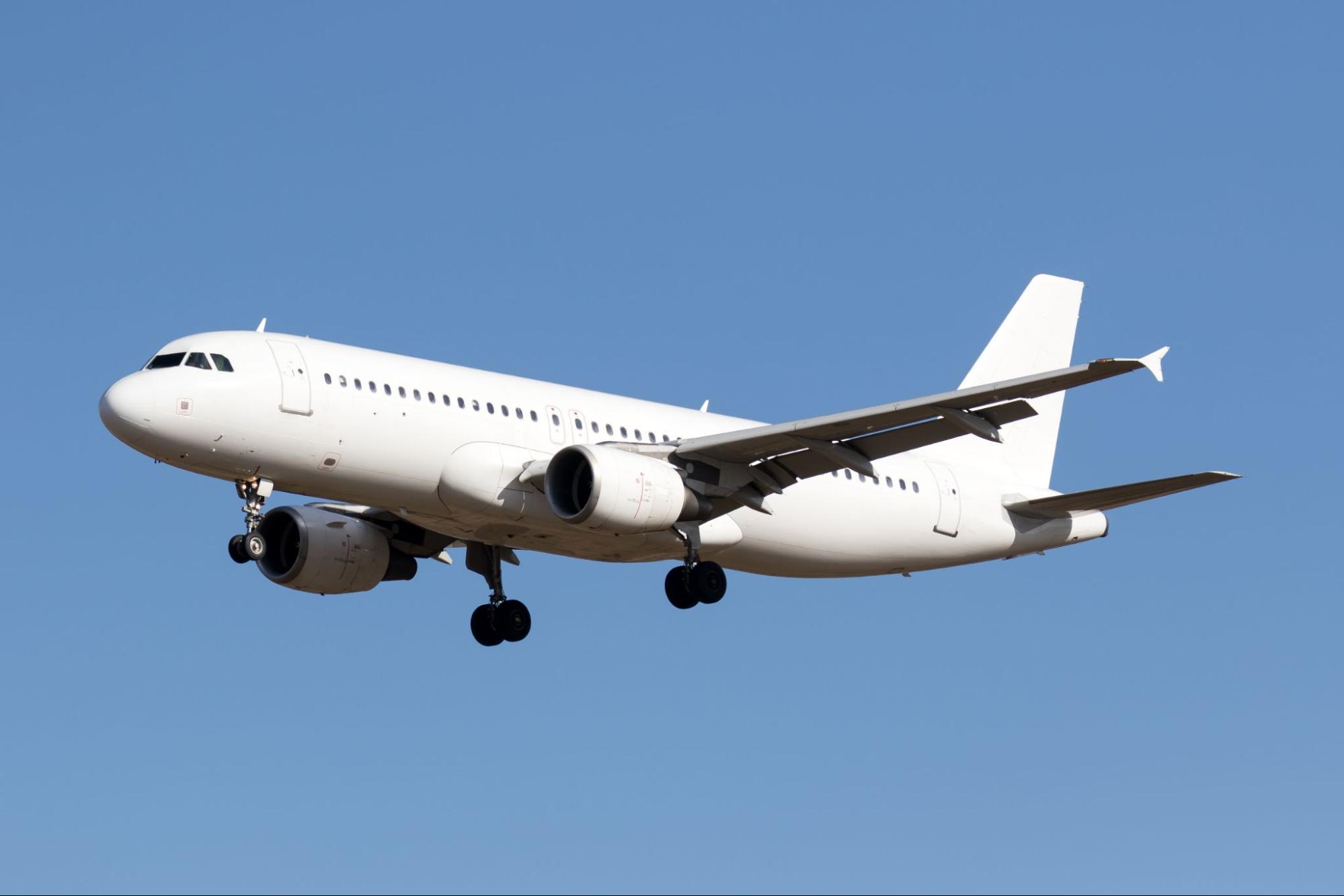 White airplane (Airbus A320).